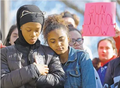  ?? LLOYD FOX/BALTIMORE SUN ?? An estimated 700 to 800 students at Dulaney High School walk out as part of Wednesday’s protest against gun violence.