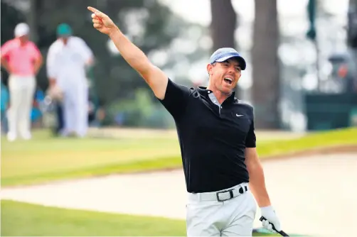  ??  ?? Fore:
Rory Mcilroy calls another wayward shot during his opening-round struggles at Augusta National