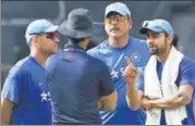  ?? REUTERS ?? New India coach Ravi Shastri will face the challenge of defining former skipper MS Dhoni’s (left) role in the team.