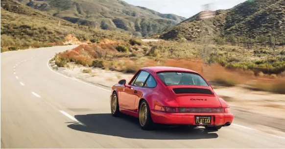  ??  ?? Shark Werks 964 looks just perfect. Suspension drop is assisted by Bilstein B16 coilovers