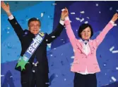  ?? — AFP ?? Moon Jae-In poses with Democratic Party leader Choo Mi-Ae after he was elected as presidenti­al candidate of the party during a party primary for the upcoming presidenti­al election in Seoul on Monday.