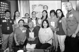  ??  ?? Photo shows (standing, from left) Dalfhen Samson, doctors Carmie Chua, Lulubelle Barcelona, Ma. Mercedes Agustin, Gloria Mendozam, Jen Serrano, Albert Uy, (seated) doctor Bless Bertos, dentist Rosalina Cuenca, and SMFI’s Connie Angeles.