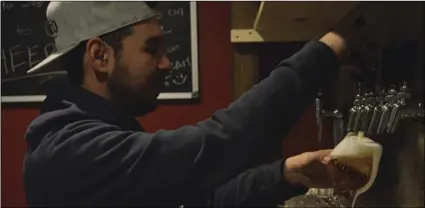  ??  ?? Calexico Brewing Co. co-founder Jose Luis Yepez pours a blonde ale at the brewery Monday. Blonde ales are often considered a “gateway” beer for those who are not yet acquainted with the various craft beer styles. JULIO MORALES PHOTO