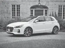  ?? DEREK MCNAUGHTON/ DRIVING ?? The Elantra GT hatchback costs a bit more than its sedan stablemate but is worth it.