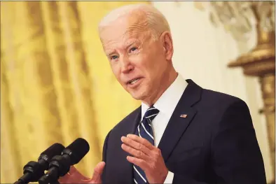  ?? Chip Somodevill­a / TNS ?? President Joe Biden talks to reporters during the first news conference of his presidency in the East Room of the White House on Thursday.