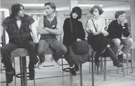  ?? UNIVERSAL PICTURES ?? Judd Nelson, left, Emilio Estevez, Ally Sheedy, Molly Ringwald and Anthony Michael Hall in a scene from John Hughes’ iconic film about high school cliques, The Breakfast Club. “How are we meant to feel about art that we both love and oppose?” Ringwald...