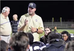  ?? / Lorene Parker ?? Head Coach Biff Parson talks to his players after their 62-13 Homecoming win over Armuchee on Friday.