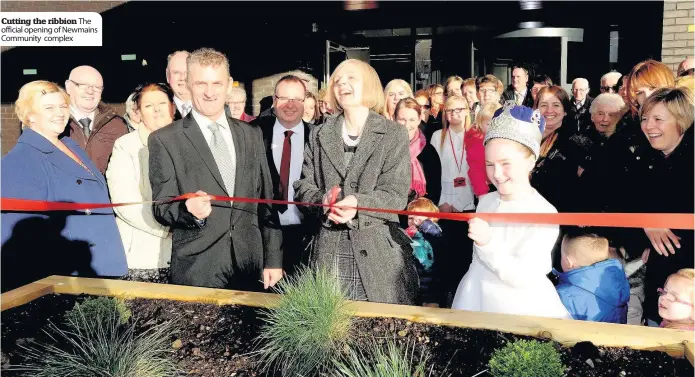  ??  ?? Cutting the ribbion The official opening of Newmains Community complex