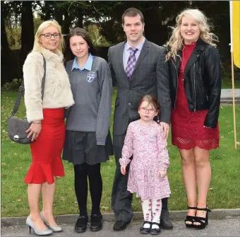  ??  ?? Nicole Cooney who made her Confirmati­on with her parents Carl and Jennifer, sister Sophie and cousin Jade at Holy Cross Church, Kenmare on Tuesday.