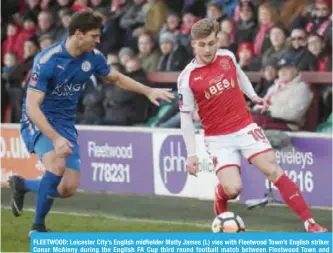  ??  ?? FLEETWOOD: Leicester City’s English midfielder Matty James (L) vies with Fleetwood Town’s English striker Conor McAleny during the English FA Cup third round football match between Fleetwood Town and Leicester City at Highbury Stadium in Fleetwood. — AFP