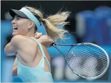  ?? AARON FAVILA/The Associated Press ?? Maria Sharapova hits a backhand return to Alize Cornet during her thirdround win at the Australian Open Saturday.