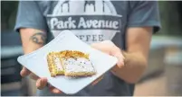  ??  ?? Park Avenue Coffee creates 73 different flavours of the city’s gooey butter cake, with its crumbly crust and custard top.