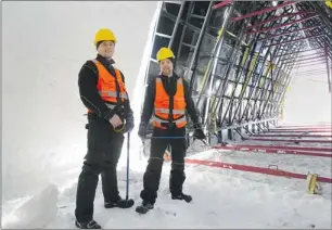  ??  ?? The Kurtakko brothers,  Rami and
Tomi,  have come from Finland to oversee constructi­on of the Montreal Snow Village. Crews began building the dome-shaped pavilions in December, when the temperatur­e dropped to a constant -2 C or colder, with the kind...