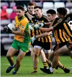  ??  ?? Last-gasp hero: Corofin’s Micheál Lundy gets away from the defence