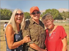  ??  ?? Eastern Sierra Tri- County Fairground­s Board President Judy Waggoner, CEO Jen McGuire and VFW Post 8988 Auxiliary member Cheryl Underhill smile for the camera Tuesday.