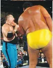  ?? WWE ?? Left: Andre the Giant,wrestles Neidhart.