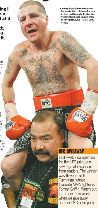  ?? Photo: Getty ?? Johnny Tapia is hoisted up after his loss to Marco Antonio Barrera in their middleweig­ht fight at Las Vegas’ MGM Grand Garden Arena in November 2002.