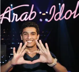  ??  ?? Palestinia­n performer Mohammad Assaf has been dubbed “the Rocket” by the Lebanese singer Ragheb Alama, who is a judge on the show. (AFP)