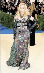  ?? NEILSON BARNARD / GETTY IMAGES ?? Madonna attends the “Rei Kawakubo/Comme des Garcons: Art Of The In-Between” Costume Institute Gala at the Metropolit­an Museum of Art on Monday in New York City.