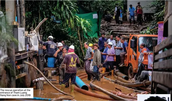  ??  ?? The rescue operation at the entrance of Tham Luang Nang Non cave in July 2018