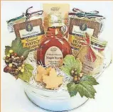  ?? WISCONSINM­ADE ?? WisconsinM­ade’s “Breakfast Treats Gift Bucket” features maple syrup, pancake mix, coffee and maple candy, all from Wisconsin.