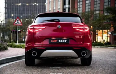  ??  ?? from top Facia is a direct carryover from the Giulia sedan; even the steering wheel is the same item; oversized chrome tail-pipe finishers look sporty, one on each side of the rear bumper; Stelvio does that famed logo justice; even from behind, the...