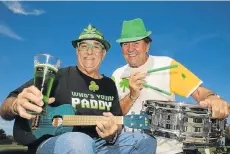  ?? Picture: WERNER HILLS ?? WHO’S YOUR PADDY: The Bay City Rockers members Rod Johnson, left, and Larry Kozak were part of the Bay City Irish Band playing at Eddie Mac’s at Victoria Park on Saturday in honour of St Patrick’s Day