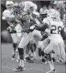  ?? AP/CHUCK BURTON ?? Florida State wide receiver Rashad Greene (80) catches a pass Saturday in front of Georgia Tech defensive back D.J. White in the ACC Championsh­ip Game.