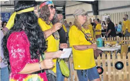  ?? KATHY JOHNSON ?? With a 1950s, 1960s era theme, there was bound to be a few hippies show up for Walk for the Cause at the Barrington Regional Curling Club last year.