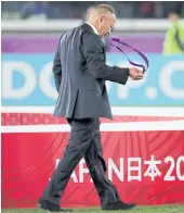  ??  ?? England coach Eddie Jones reacts after receiving his World Cup silver medal.
