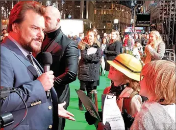  ??  ?? Barmy questions were in store for the cast of Jumanji: Welcome to the Jungle, as Cole and Corey Hebden from Hinckley interviewe­d the stars including Jack Black