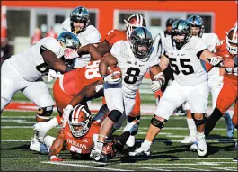  ?? DARRON CUMMINGS/AP ?? Purdue’s Markell Jones (8) runs out of the tackle of Indiana’s Reakwon Jones for a touchdown on Saturday.