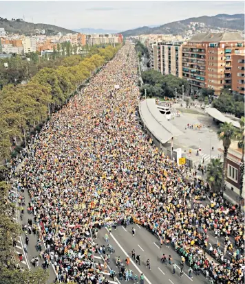  ??  ?? Police said that around 525,000 people converged on Barcelona yesterday in a response to Spain’s jailing of nine Catalan leaders