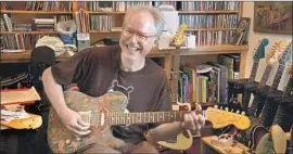  ?? Emma Franz ?? GUITARIST Bill Frisell’s life story and career are covered in a new documentar­y.