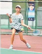  ?? ?? Chloe Wong of Hong Kong outguns top seeded Catherine Liew from Malaysia in the quarterfin­als to cause the biggest upset in the girls singles.