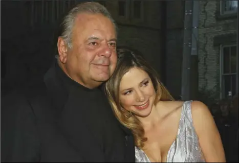  ?? ASSOCIATED PRESS ?? Mira Sorvino (right) and father Paul Sorvino attend the premiere of “Reservatio­n Road”, Sept. 13, 2007, during the Toronto Internatio­nal Film Festival in Toronto.