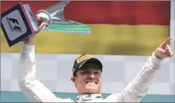  ?? Reuters ?? After winning the Belgian GP, Mercedes' Nico Rosberg is just nine points behind teammate and championsh­ip leader Lewis Hamilton.