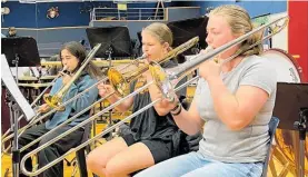  ?? ?? Young trombone players rehearsing under one of the best, David Bremner.