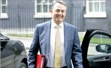  ?? PTOLGA AKMEN/AFP ?? Britain’s Internatio­nal Trade Secretary Liam Fox leaves 10 Downing street in London.