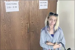  ?? ANDREW WELSH-HUGGINS — THE ASSOCIATED PRESS ?? Chelsea Rivera, 27, stands outside Franklin County evictions court in Columbus, Ohio on Monday as she awaits a hearing on an eviction notice filed against her last month.