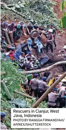  ?? PHOTO BY RANGGA FIRMANSYAH/ AP/REX/SHUTTERSTO­CK ?? Rescuers in Cianjur, West Java, Indonesia