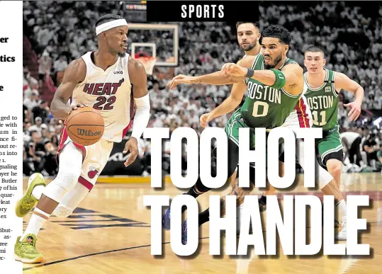  ?? —USA TODAY SPORTS ?? Jimmy Butler (left) and the Miami Heat were a step ahead of Jason Tatum and the Boston Celtics in the series-opener.