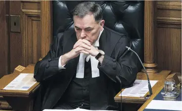  ?? — THE CANADIAN PRESS ?? House Speaker Darryl Plecas pauses for a moment prior to Lt.-Gov. Janet Austin delivering the Speech from the Throne Tuesday in the legislatur­e in Victoria. Plecas is standing by his allegation­s of overspendi­ng by officials.