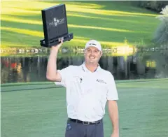  ?? AFP ?? Jason Kokrak lifts the trophy after winning the CJ Cup in Las Vegas.