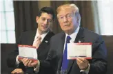  ?? Drew Angerer / Getty Images ?? House Speaker Paul Ryan watches as President Trump talks about the tax- reform plan.