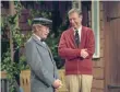  ?? Lynn Johnson ?? Mr. McFeely (David Newell) with Fred Rogers on “Mister Rogers’ Neighborho­od.”