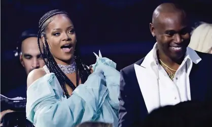  ?? Photograph: John Phillips/BFC/Getty Images ?? Rihanna and Jahleel Weaver of Fenty head to the stage to collect the Urban Luxe Award.