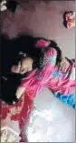  ?? HT PHOTO ?? Injured Sanju lying on the floor at her home at Baroli village in Jind.