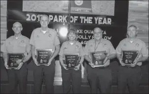  ?? Submitted photo ?? AWARD WINNERS: Lake Ouachita, Woolly Hollow, Village Creek, Logoly and Petit Jean State Parks were selected as the Park of the Year (POY) for the five regions in the parks system at the recently held annual Superinten­dents Conference. From left,...