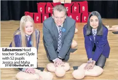  ??  ?? Lifesavers­Head teacher Stuart Clyde with S2 pupils Jessica and Maha
